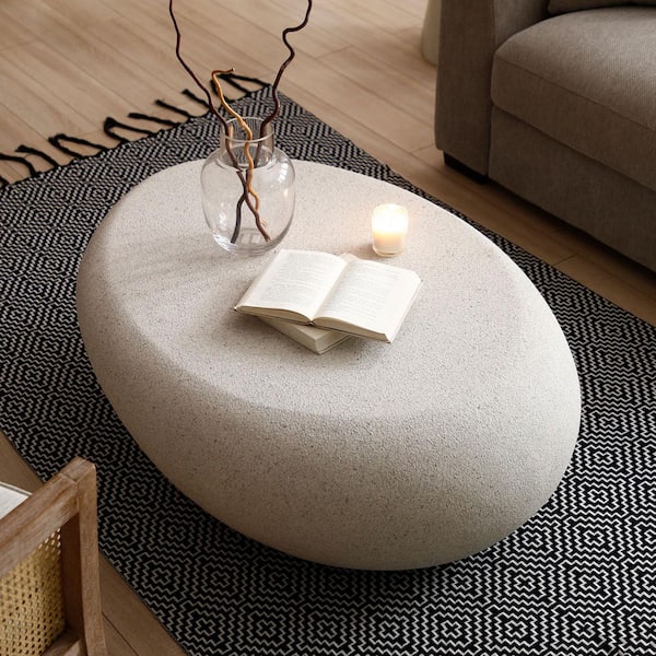 Argus 43.31 in. W White Oval Glass Fibre Elliptical Coffee Table, Faux Matte Rocks Table