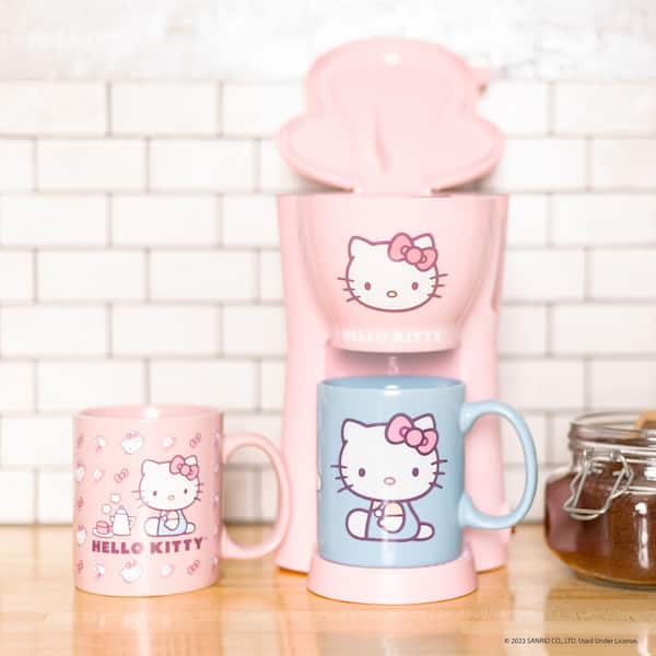 https://images.thdstatic.com/productImages/0f8ce9ac-a7bb-4435-9368-2fe8038fe095/svn/pink-uncanny-brands-drip-coffee-makers-cm2-kit-hk1-a0_600.jpg