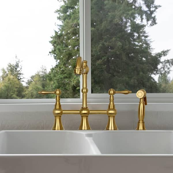 https://images.thdstatic.com/productImages/0faa4f95-7941-461e-aee7-879094f35705/svn/brushed-gold-akicon-bridge-kitchen-faucets-ak718-btg-c3_600.jpg