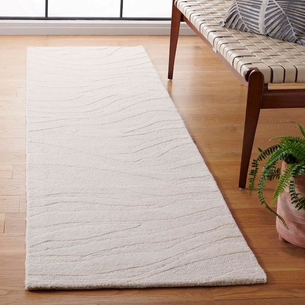 SAFAVIEH Rodeo Drive 2 ft. x 8 ft. Ivory Solid Wavy Runner Rug RD175A ...