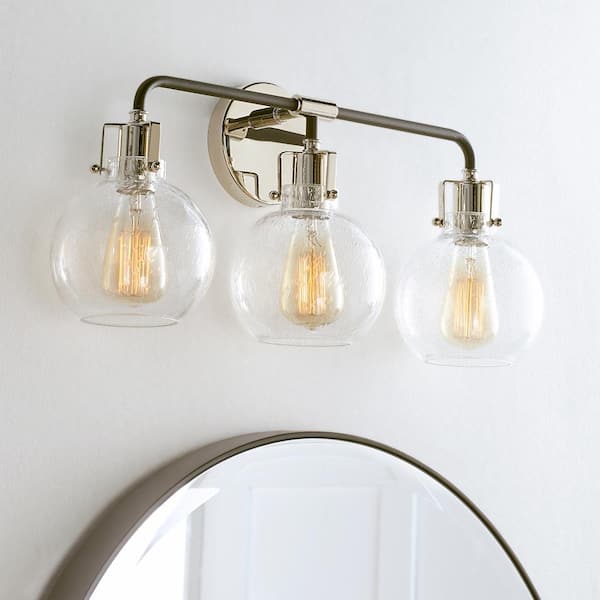 Generation Lighting - Clara 5 in. Polished Nickel Sconce with Clear Seeded Glass