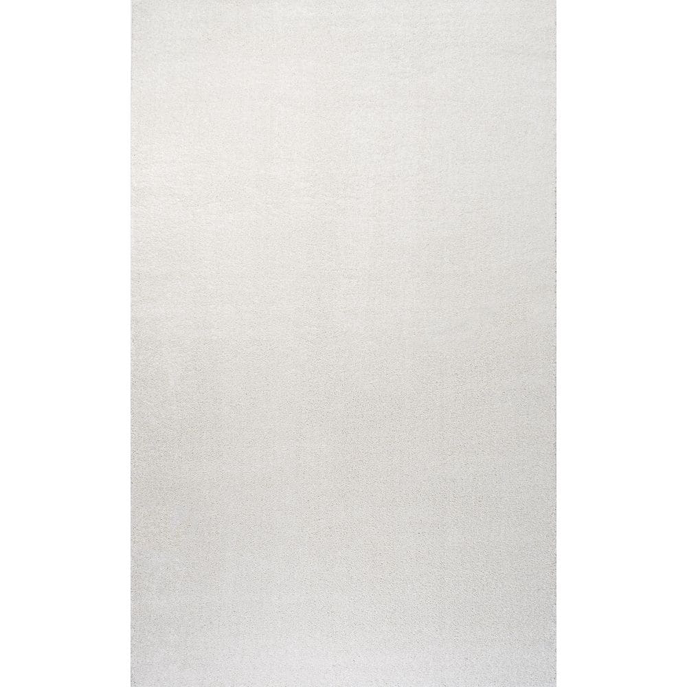 Cream Solid Synthetic Low-Pile Reversible Area Rug 8 x 10