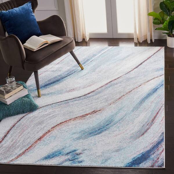 Phoenix 5 ft. x 8 ft. Ivory/Blue Wavy Marble Area Rug
