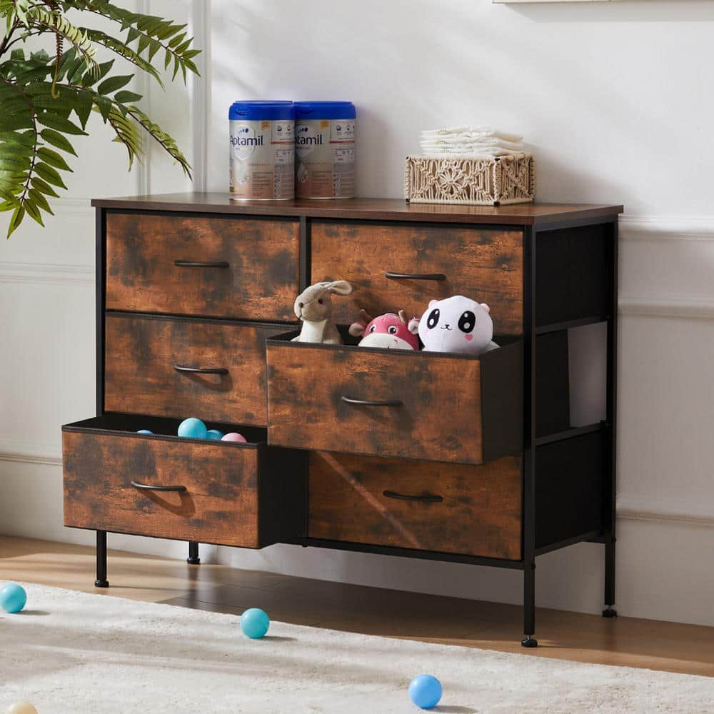 https://images.thdstatic.com/productImages/0fcfbb77-2e0e-4dac-b12a-4e97836c5e1f/svn/brown-teamson-kids-chest-of-drawers-hd-cab-6bc-rust-64_1000.jpg