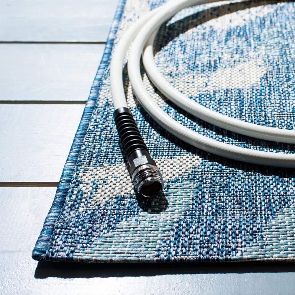 Navy Blue Floral Synthetic 9' x 12' Outdoor Rug