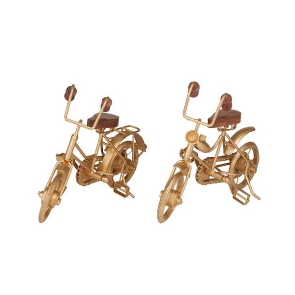 Litton Lane Gold Metal Bike Sculpture with Wood Accents (Set of 2)