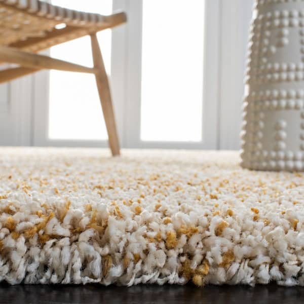 SAFAVIEH Hudson Shag 9 ft. x 12 ft. Ivory/Gold Solid Marle Area