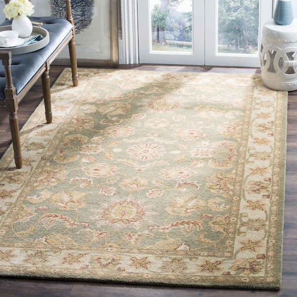 Antiquity 11 ft. x 15 ft. Green/Gold Border Solid Color Area Rug