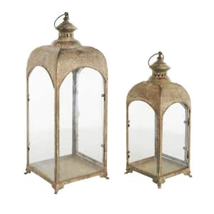 Brown Metal Distressed Vintage Inspired Candle Lantern with Arched Glass Panels Set of 2