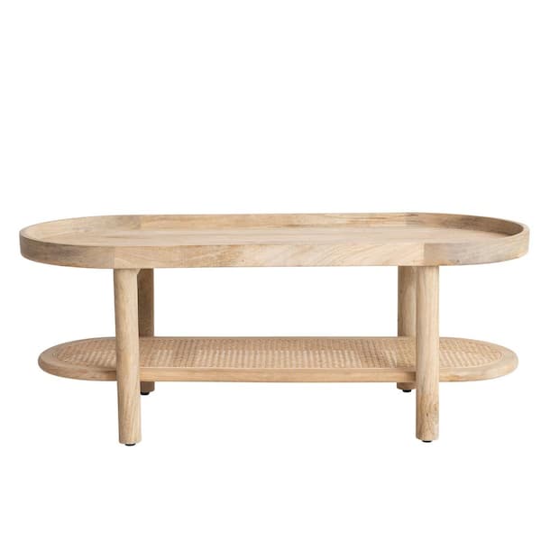 Storied Home 46.75 in. in Natural Oval Mango Wood Coffee Table with Cane Shelf