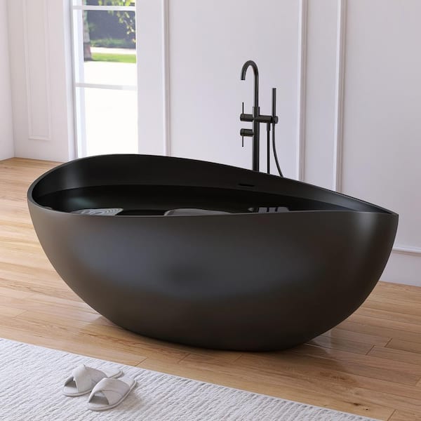 63 in. x 38.5 in. Wave Stone Resin Solid Surface Flatbottom Freestanding Soaking Bathtub in Matte Black