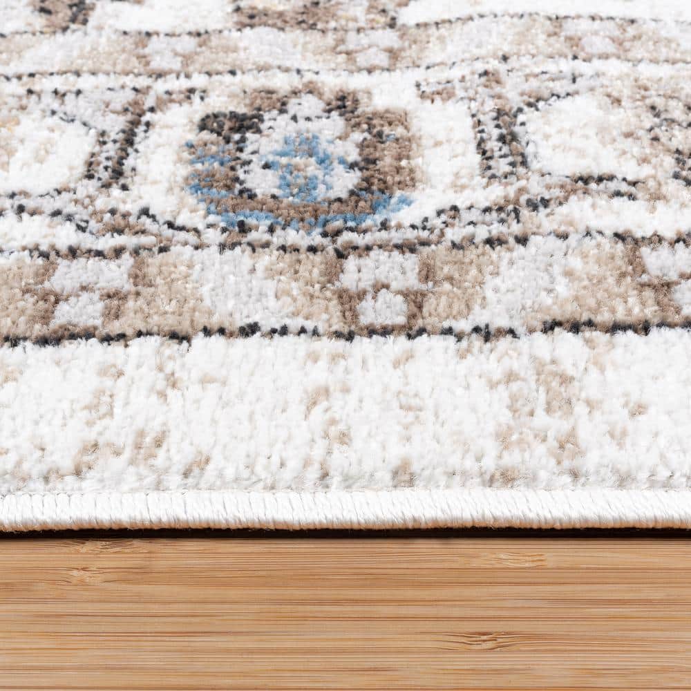 Ivory and Beige Tufted Rectangular Synthetic Area Rug 5' x 7'