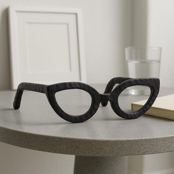 Liv & Skye Black 7 in. x 3 in. Metal Abstract Cat Eye Glasses Sculpture