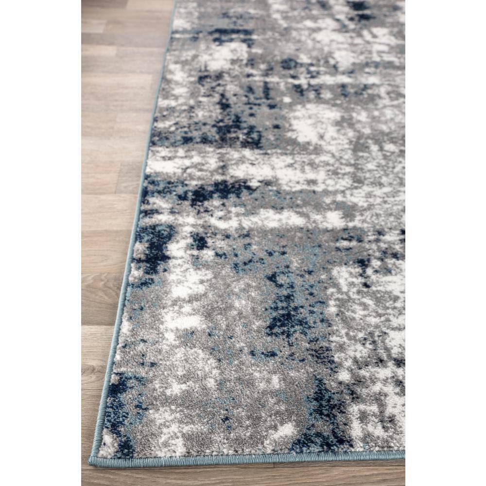 Abstract Blue Tufted Synthetic 7' 10" x 10' Area Rug