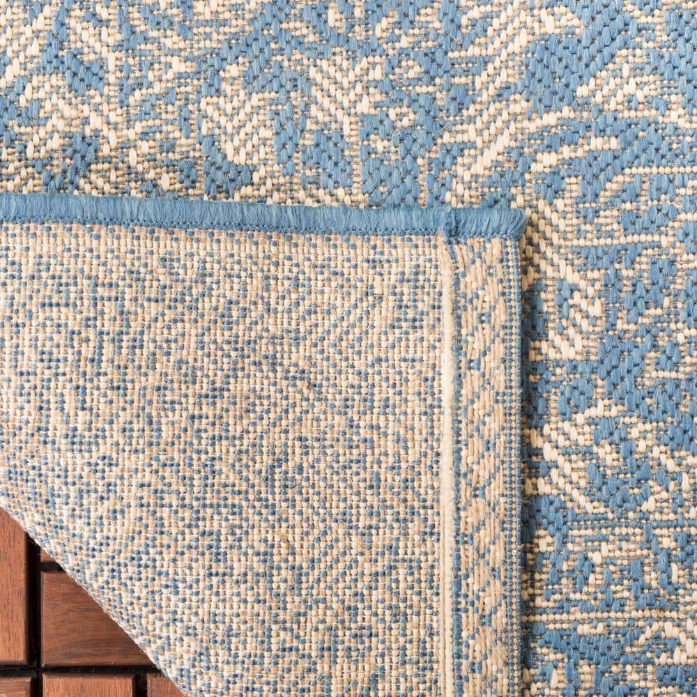 Cream and Blue Round Stain-Resistant Synthetic Rug