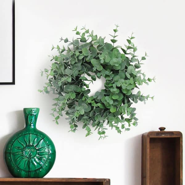 LIVING LUXURY 9 in. Frosted Green Artificial Petite Eucalyptus Leaf Foliage Greenery Wreath
