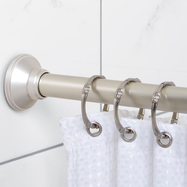 https://images.thdstatic.com/productImages/1055a9c4-7873-4f11-9009-9167cc41235e/svn/satin-nickel-zenna-home-shower-curtain-rods-72m3albnl-c3_600.jpg