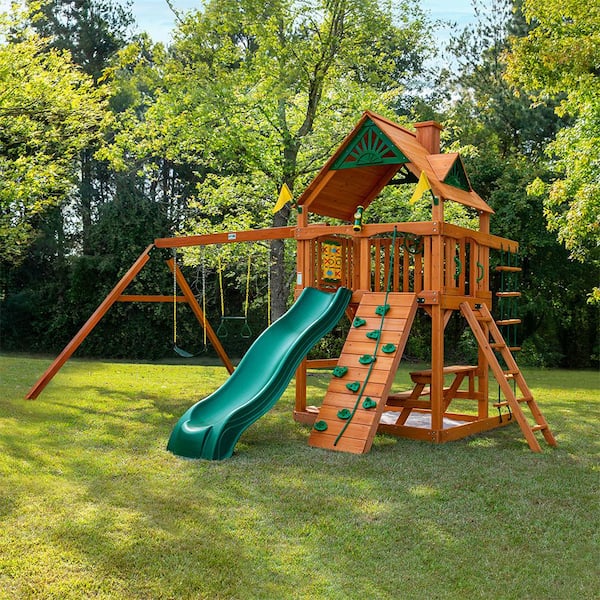 Gorilla Playsets Chateau Wooden Outdoor Playset with Wave Slide, Picnic Table, Rock Wall, Sandbox, and Backyard Swing Set Accessories