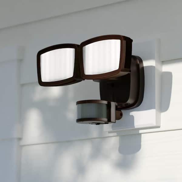VAXCEL Bronze Integrated LED Motion Sensor Dusk to Dawn Outdoor Security Flood Light - 240-Degree - 85 ft.