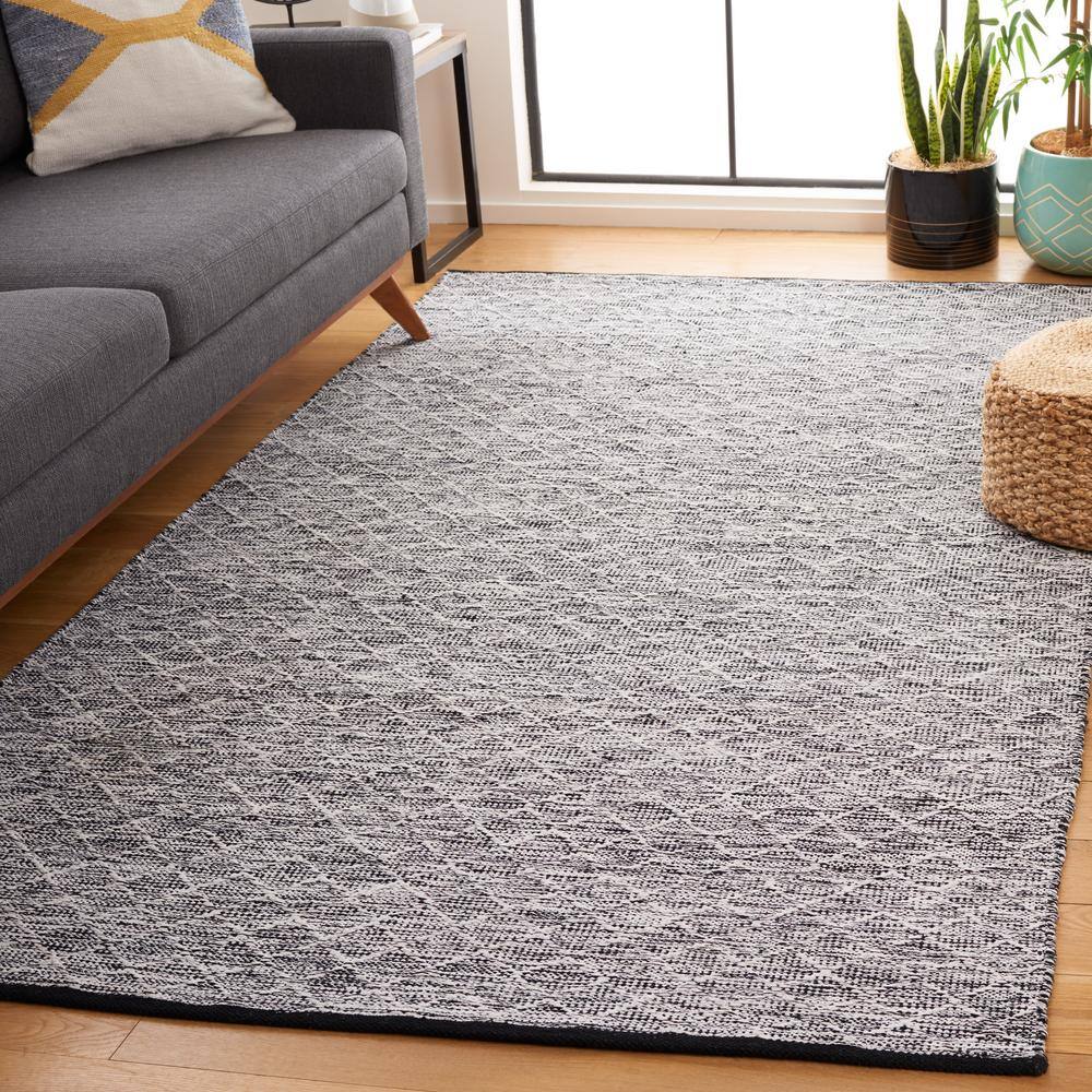 Ebony Black and Ivory Wool 6' x 9' Handmade Reversible Area Rug