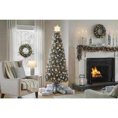 6.5 ft Sparkling Amelia Pine Potted Pre-Lit Artificial Christmas Tree with 200 White Mini Lights