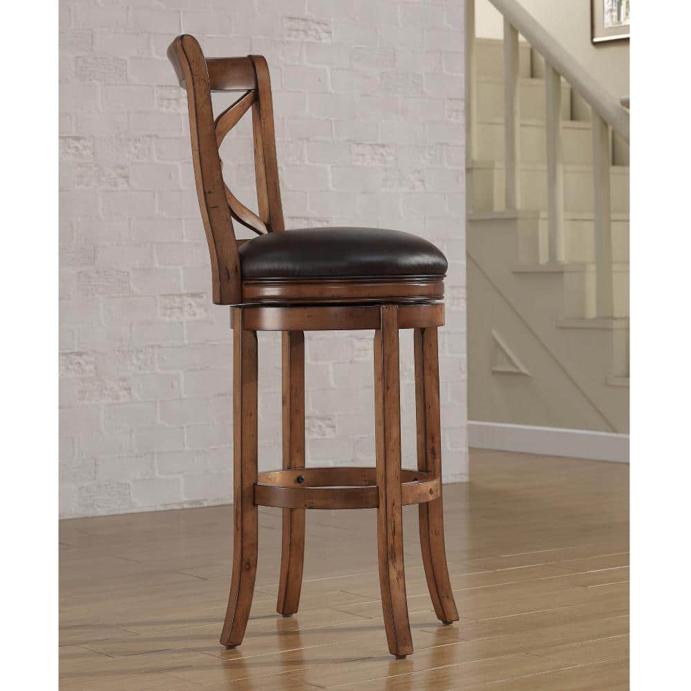 Transitional Brown Leather Swivel Chair with Carved Flower Detail