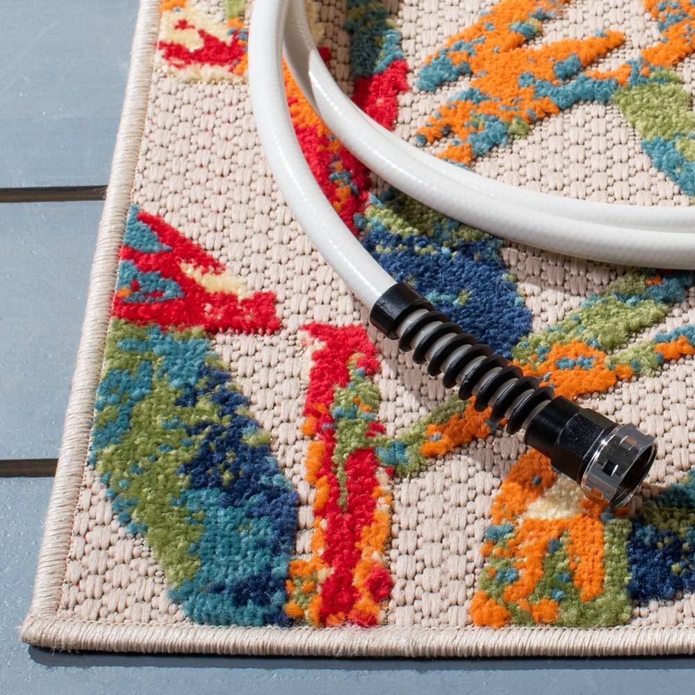 Ivory and Navy Floral Synthetic Indoor/Outdoor Rug