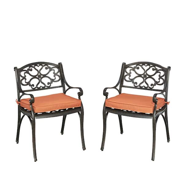 HOMESTYLES Sanibel Rust Bronze Stationary Cast Aluminum Outdoor Dining Arm Chair with Coral Cushion (2-Pack)