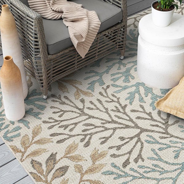 https://images.thdstatic.com/productImages/10c2bb0c-486c-443e-971b-3d086101130f/svn/cream-mohawk-home-outdoor-rugs-791360-31_600.jpg