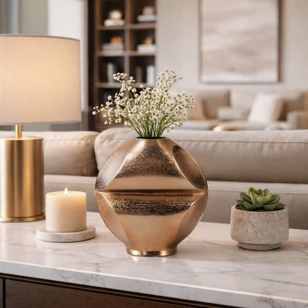 Liv & Skye 9 in. Gold Metal Round Decorative Vase HD19227-01