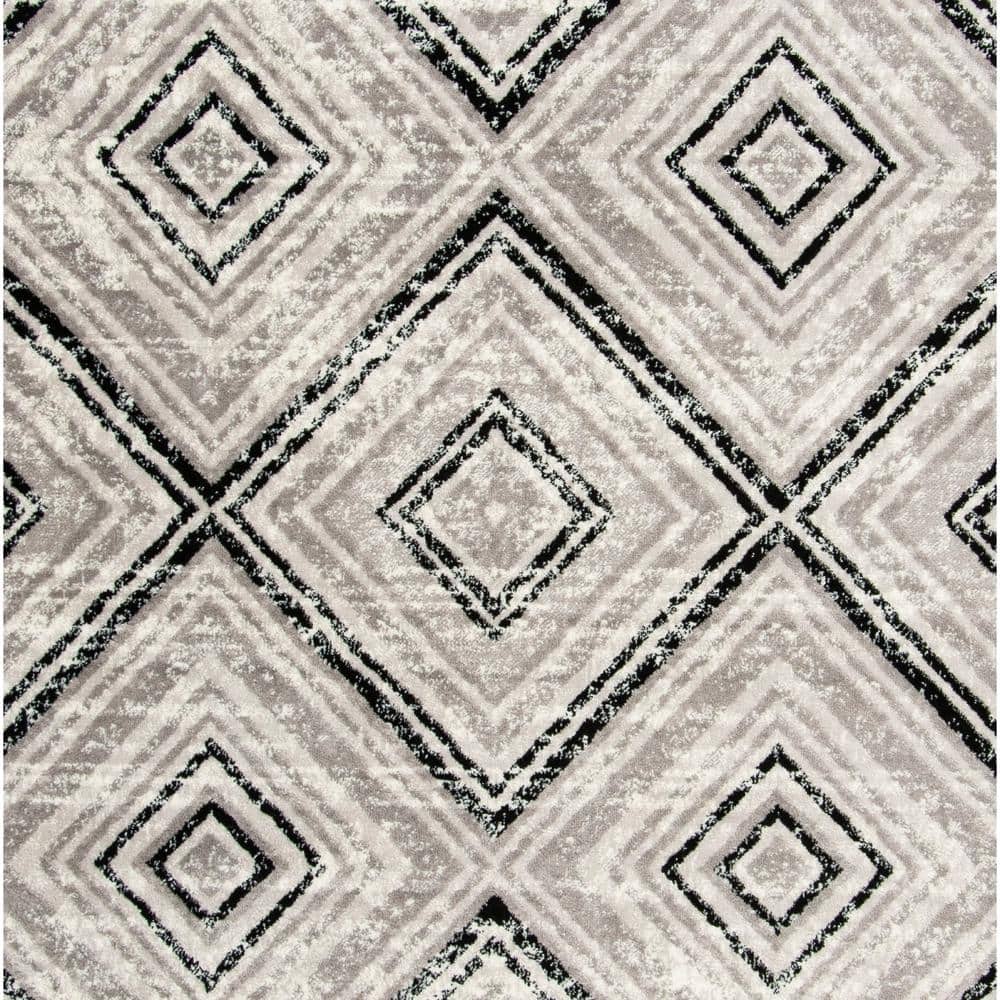 Skyler Geometric Silver Synthetic 9' x 12' Area Rug