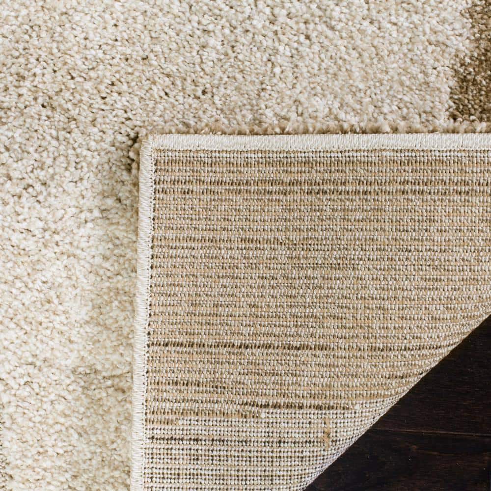 Elegant Waves Cream/Dark Brown Hand-Knotted Shag Rug 5'3" X 7'6"