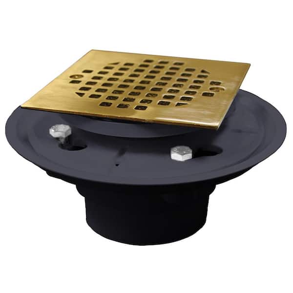 JONES STEPHENS 2 in. x 3 in. PVC Shower Drain/Floor Drain w/4 in. Polished Brass Cast Square Strainer-Fits Over 2 in. Sch. 40 DWV Pipe