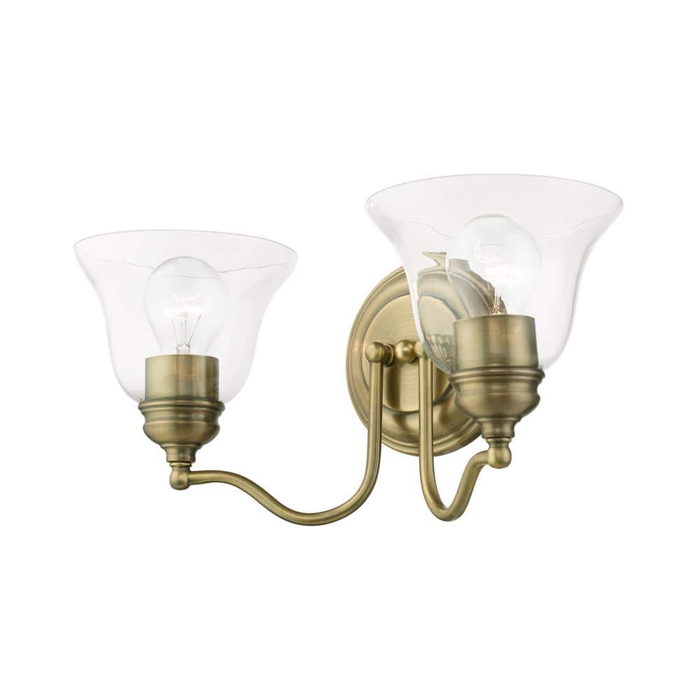 Antique Brass Dual-Light Vanity with Hand-Blown Clear Glass Shade