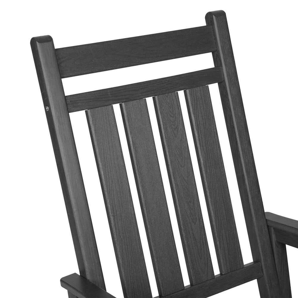 Close-up detail of the vertical slats and top rail of the chair.