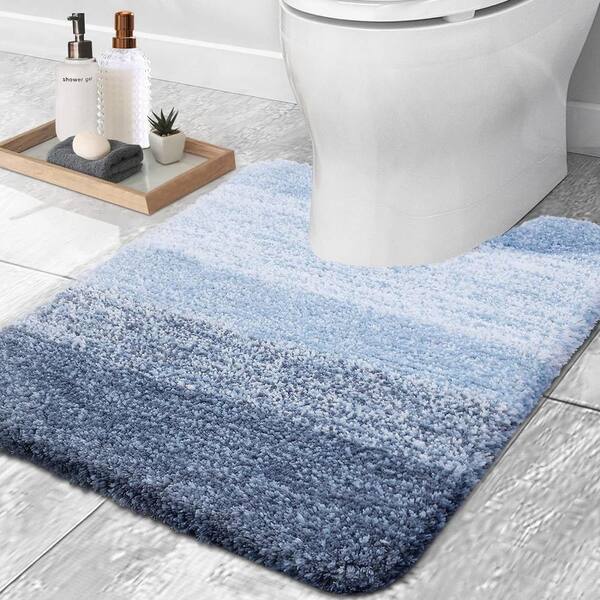 https://images.thdstatic.com/productImages/11243239-179a-444e-ad13-4eb838245fce/svn/blue-bathroom-rugs-bath-mats-snph004in213-c3_600.jpg