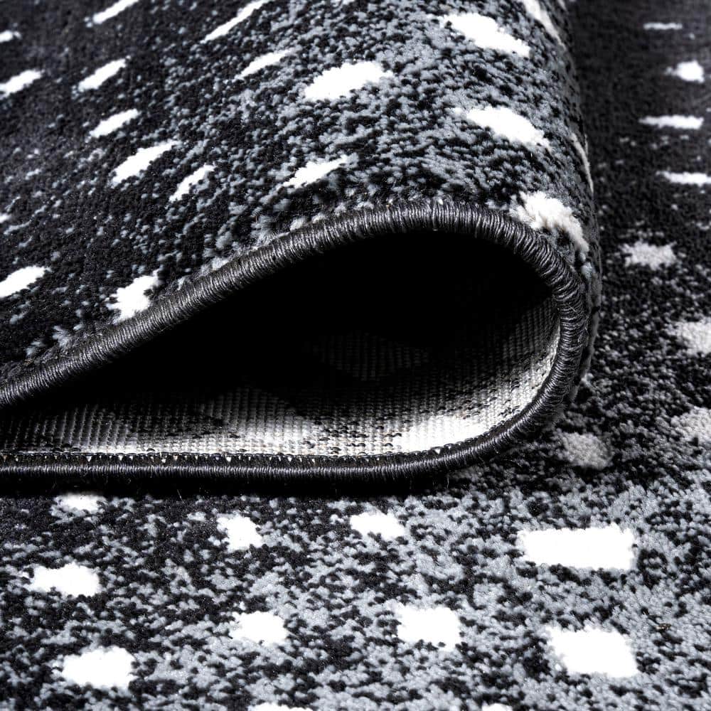 Abstract Antelope Black and Cream Synthetic 3x5 Area Rug