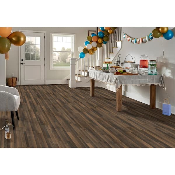 XP Junction Brown Oak 10 mm T x 7.4 in. W x 47.2 in. L Water Resistant Laminate Wood Flooring (19.63 sq. ft. /Case)