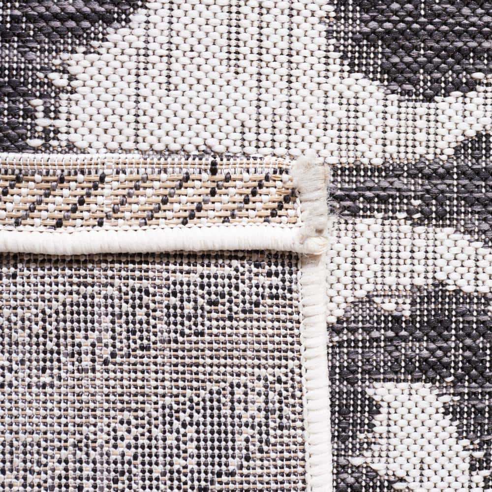 Ivory and Black Zebra Print Indoor/Outdoor Area Rug