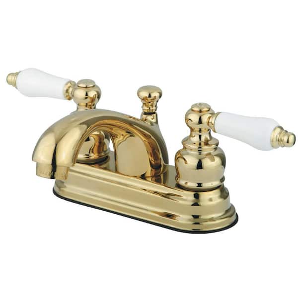 Kingston Brass Vintage 4 in. Centerset 2-Handle Bathroom Faucet with Plastic Pop-Up in Polished Brass