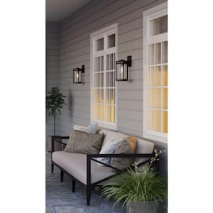 Whitmire 1-Light Matte Black with Aged Oak Accents Clear Seeded Glass Farmhouse Outdoor Wall Lantern Light