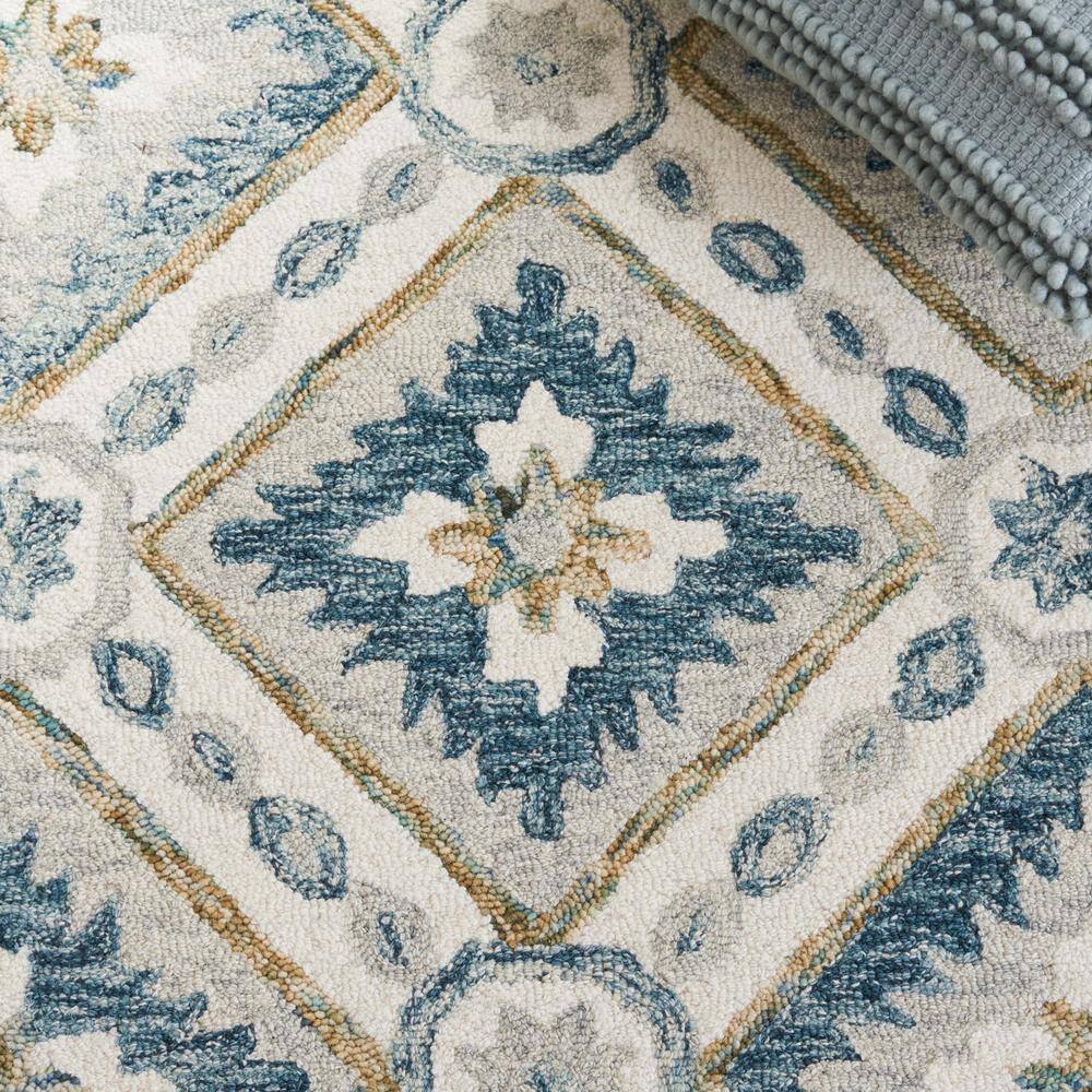 Ivory and Blue Hand Tufted Wool Rectangular Rug