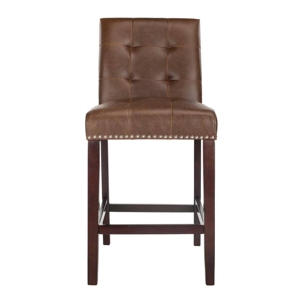 Front view of a brown wood counter stool with tufted leather upholstery.
