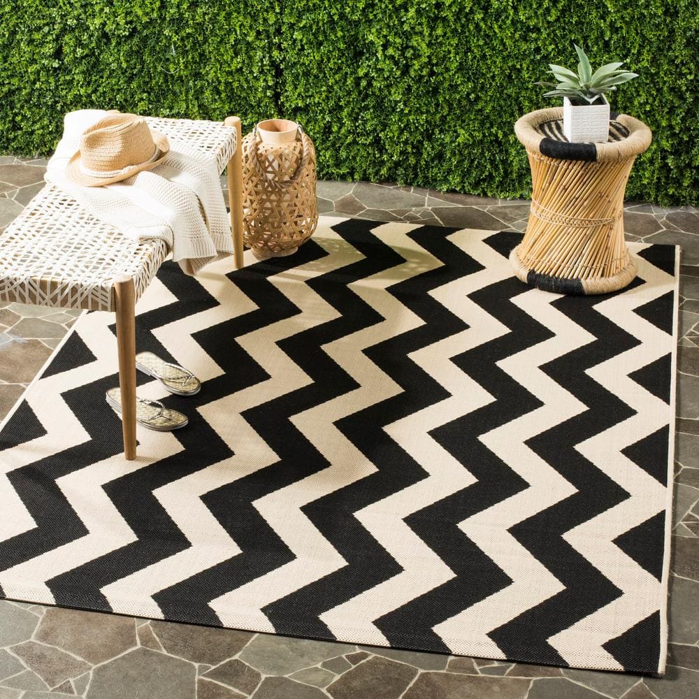 Elegant Black and Beige Rectangular Synthetic Area Rug - 47"x5'7"