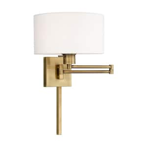 Atwood 1-Light Antique Brass Plug-In/Hardwired Swing Arm Wall Lamp with Off-White Fabric Shade