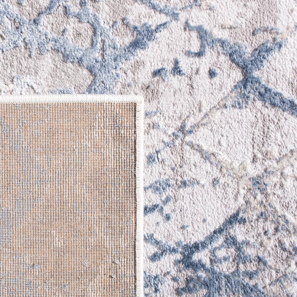 Light Grey and Blue Synthetic 10' x 14' Area Rug