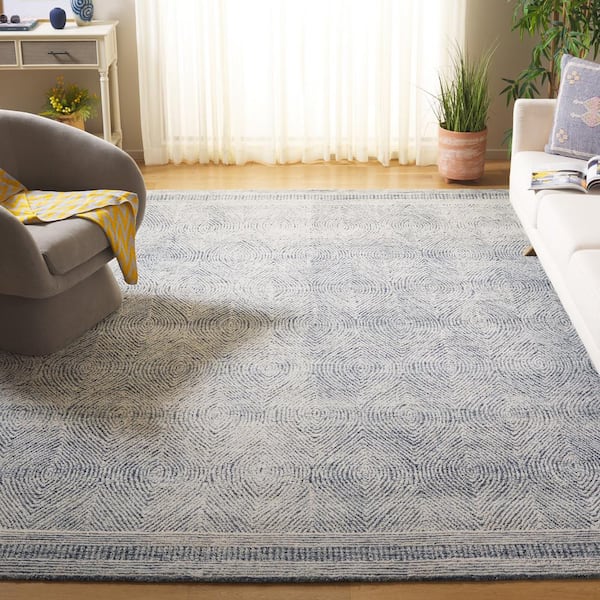 Abstract 10 ft. x 14 Ivory/Navy Geometric Area Rug