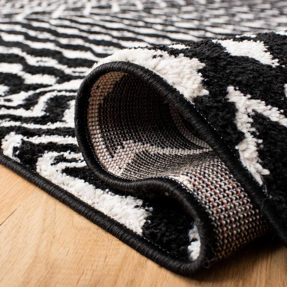 Black and Ivory Moroccan Geometric 6' x 9' Area Rug
