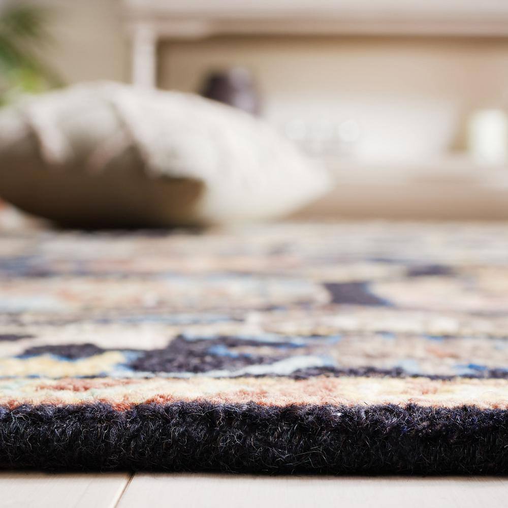 Handmade Black and Ivory Geometric Wool Round Area Rug