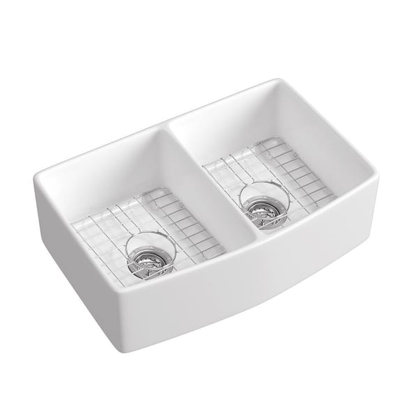 FINE FIXTURES 33 in. x 20 in. Drop-in/Undermount Double Bowl White Fireclay Curved Apron Front Kitchen Sink with Grid and Strainer